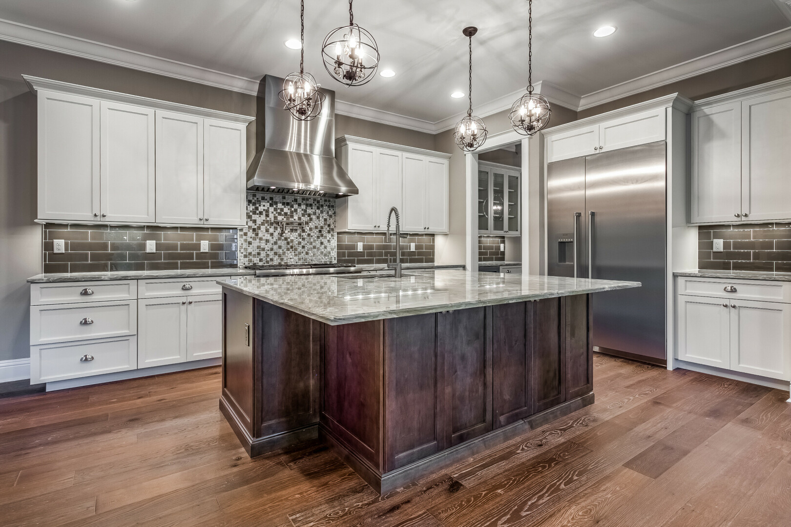 Luxury kitchen boasting a custom island and tile throughout, St. Petersburg FL