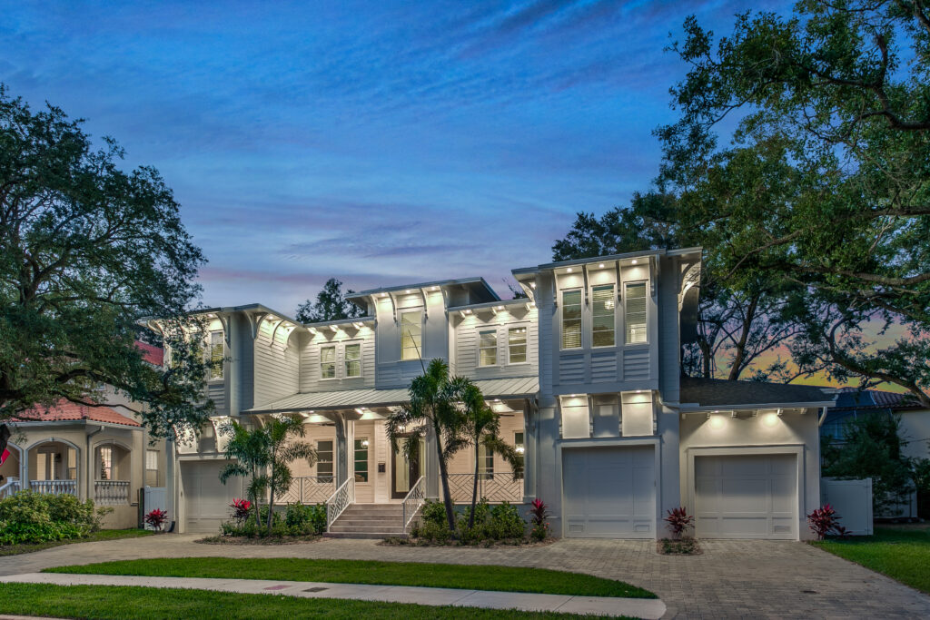 Custom waterfront home at twilight in Tampa Bay, built by Waterstone City Homes